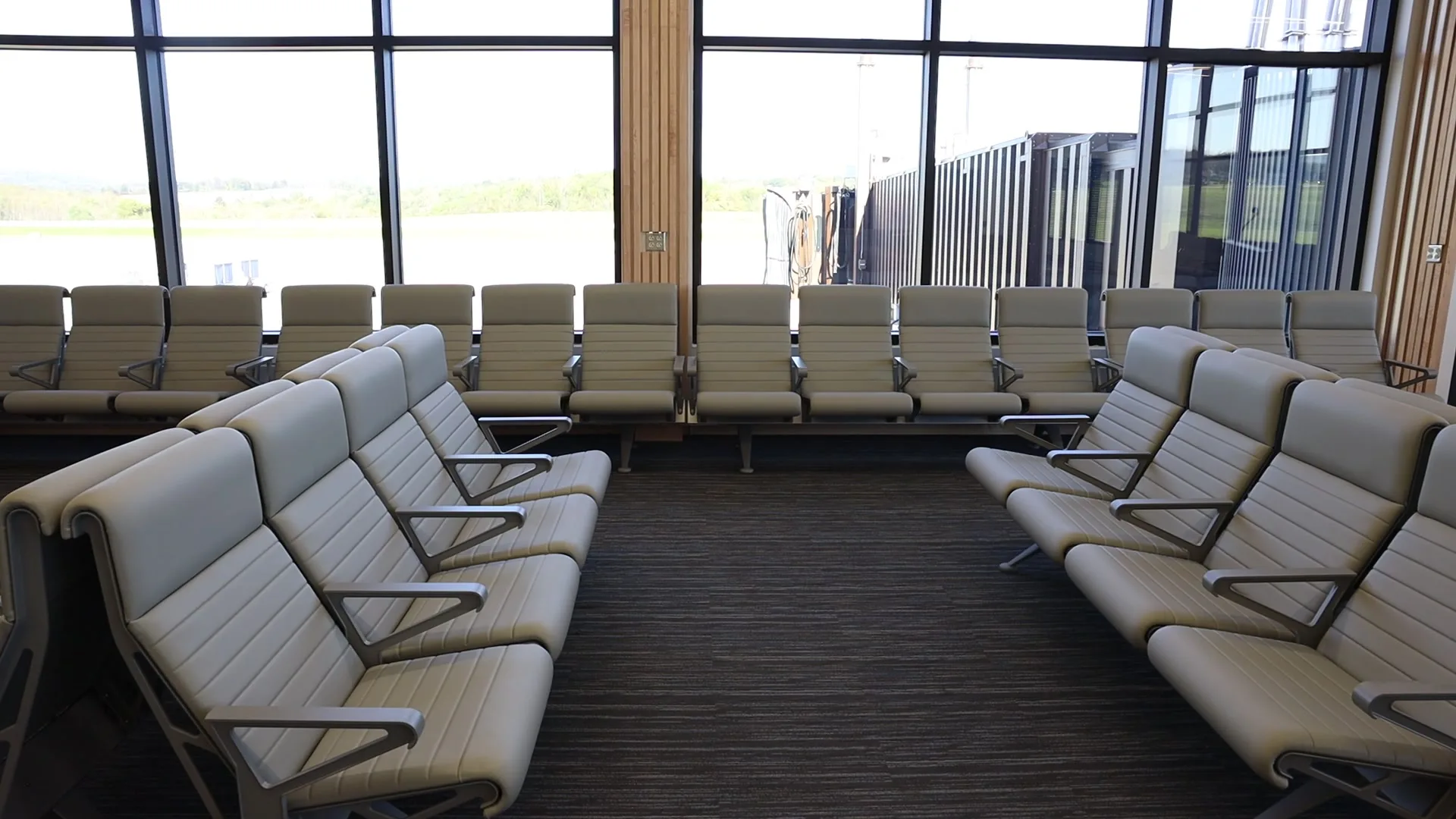 Gate-area seating by the windows, with the new jet bridge just outside